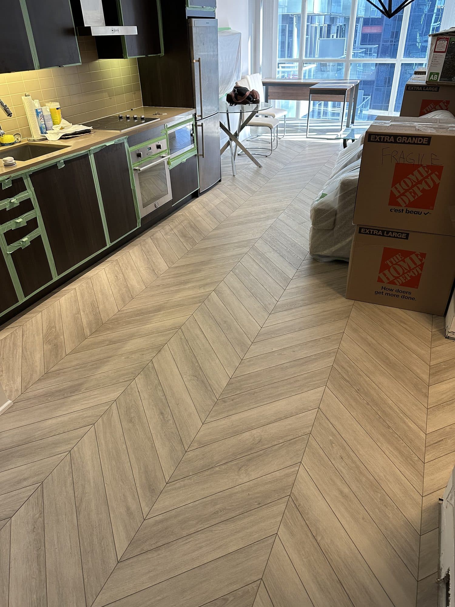 Chevron hardwood flooring installed by Woodstellar