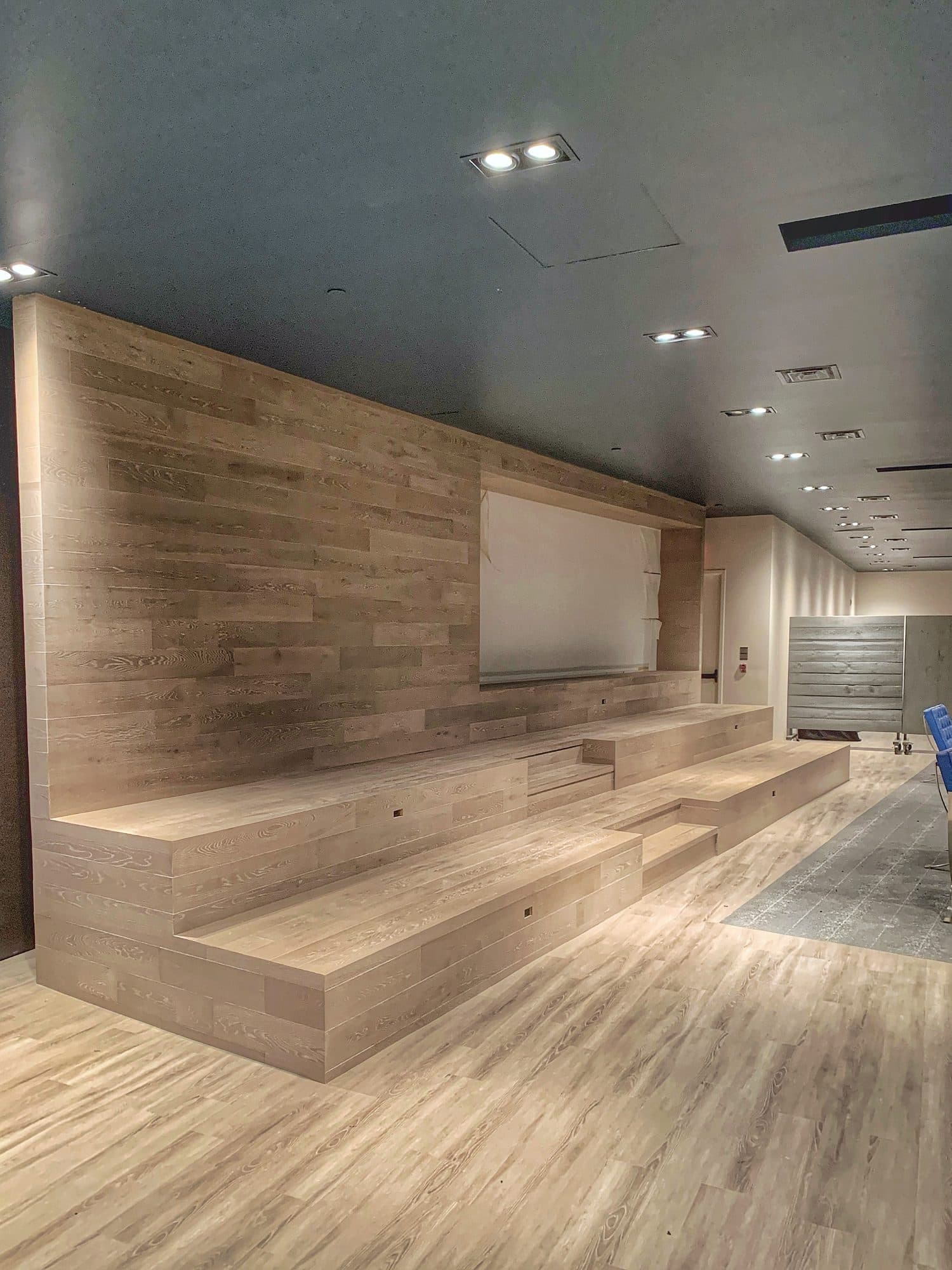 Wood stage, tiered seating and timber feature wall at the Toronto Congress Centre by Woodstellar