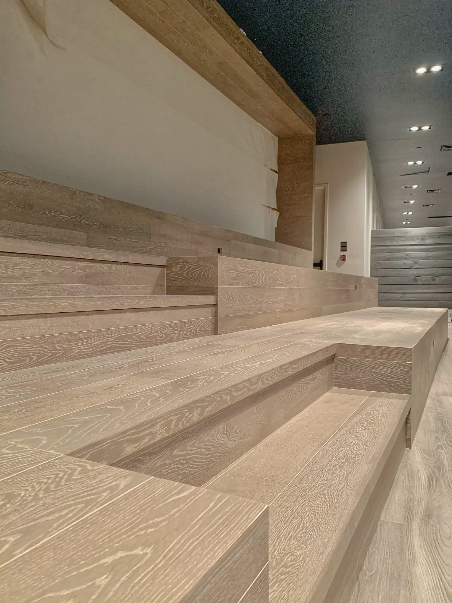 Wood stage, tiered seating and timber feature wall at the Toronto Congress Centre by Woodstellar