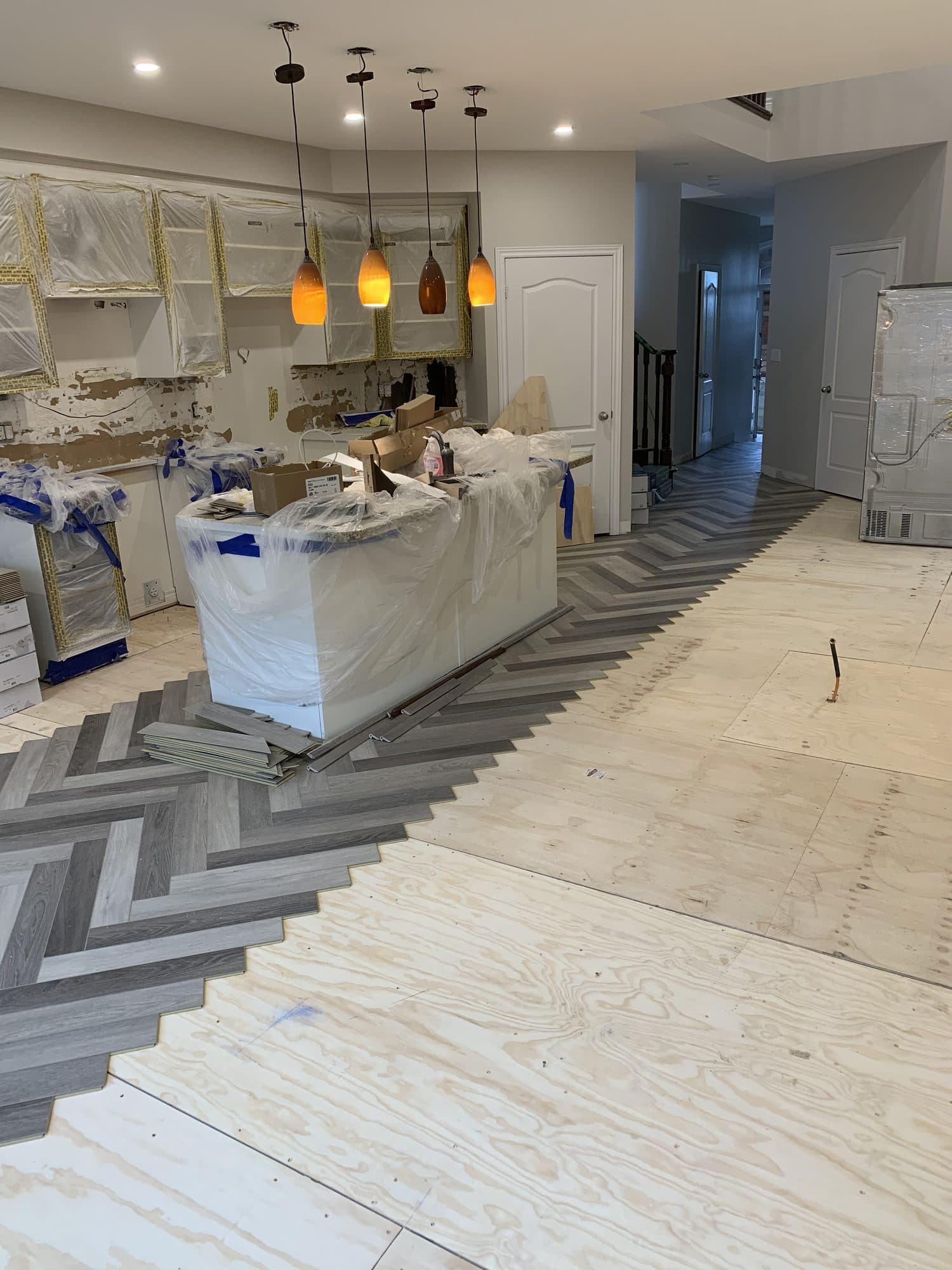 Laminate and luxury vinyl flooring installed by Woodstellar