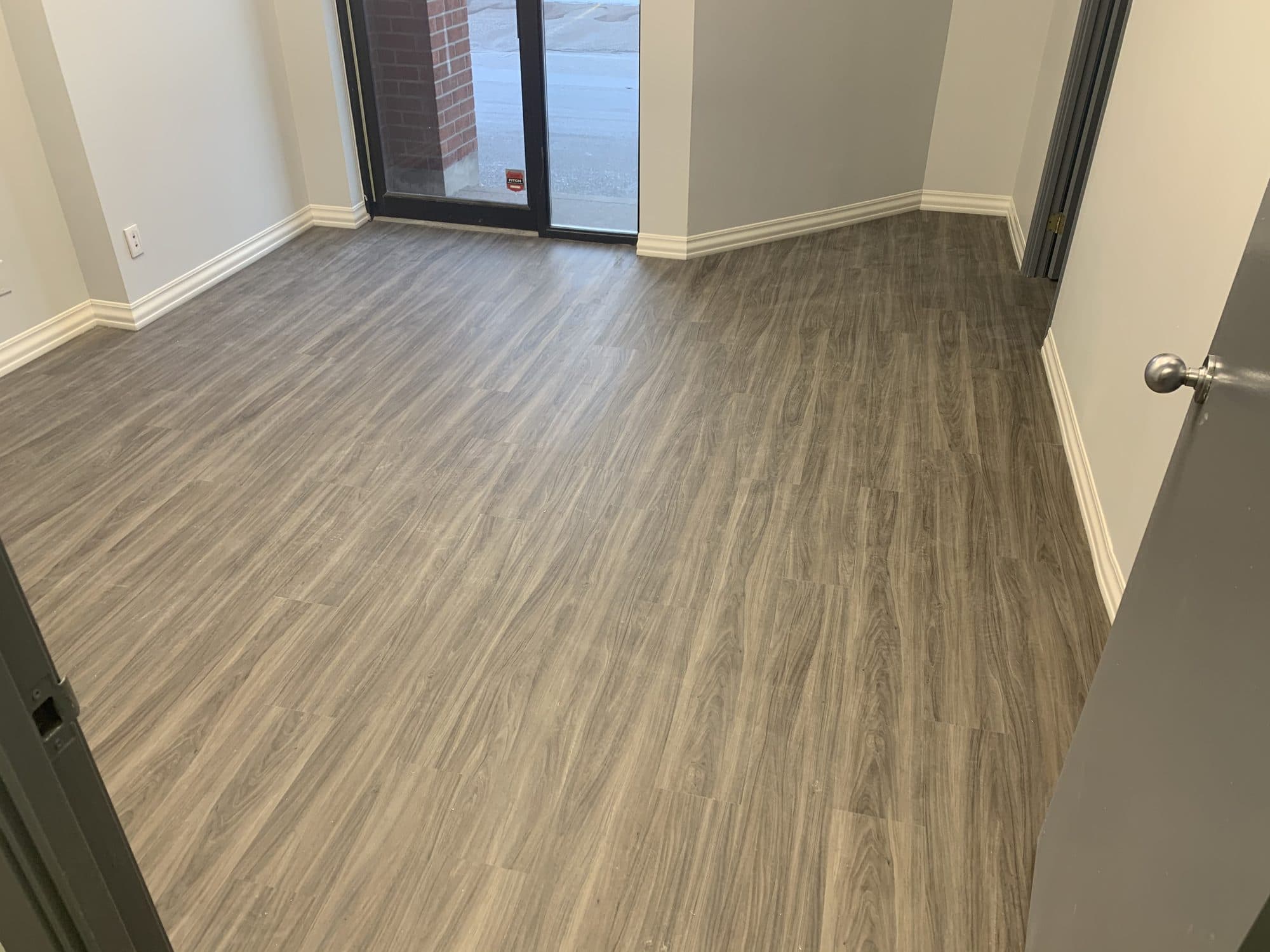 Laminate and luxury vinyl flooring installed by Woodstellar