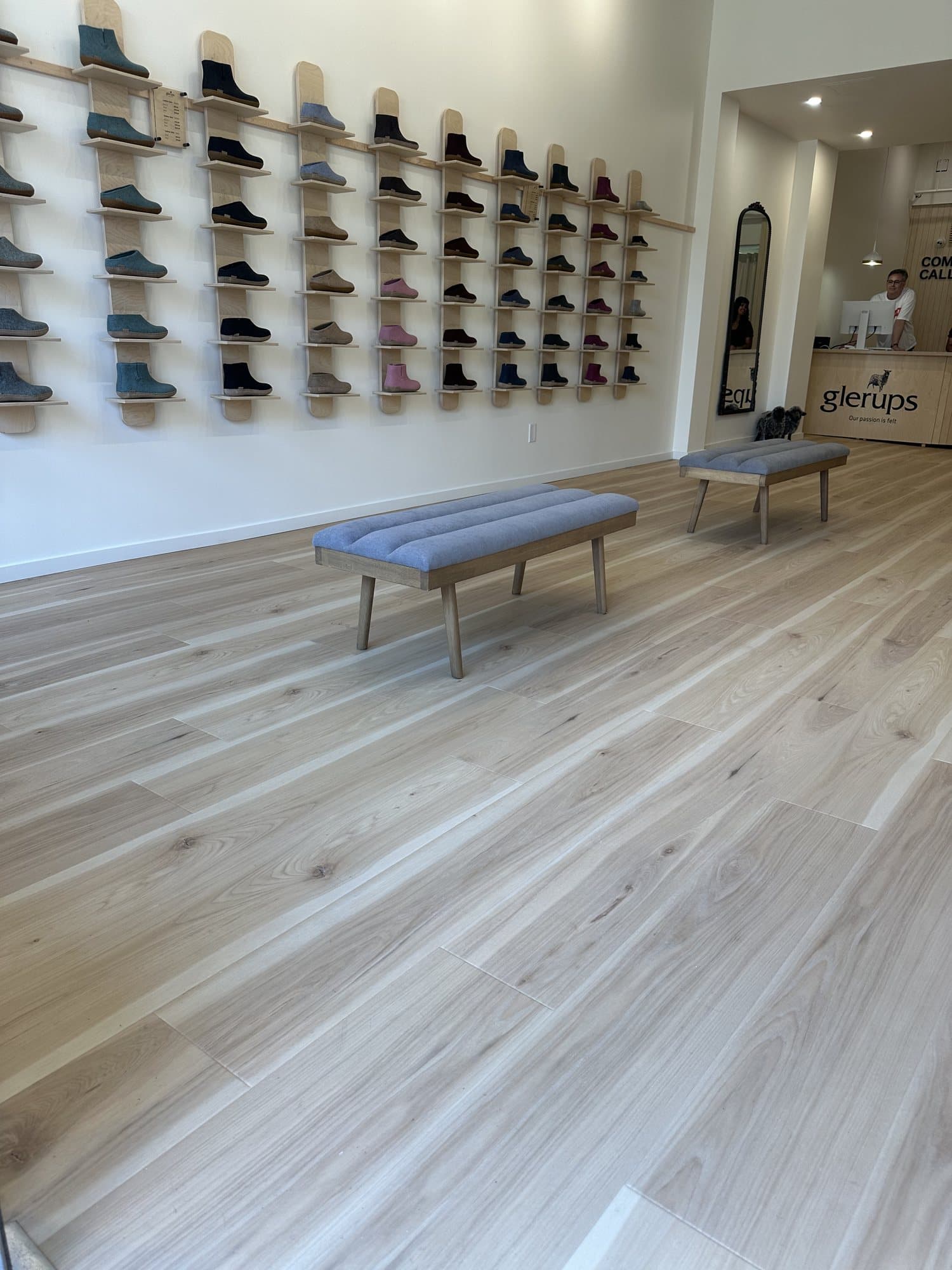 Light wood-look laminate flooring in a finished retail space
