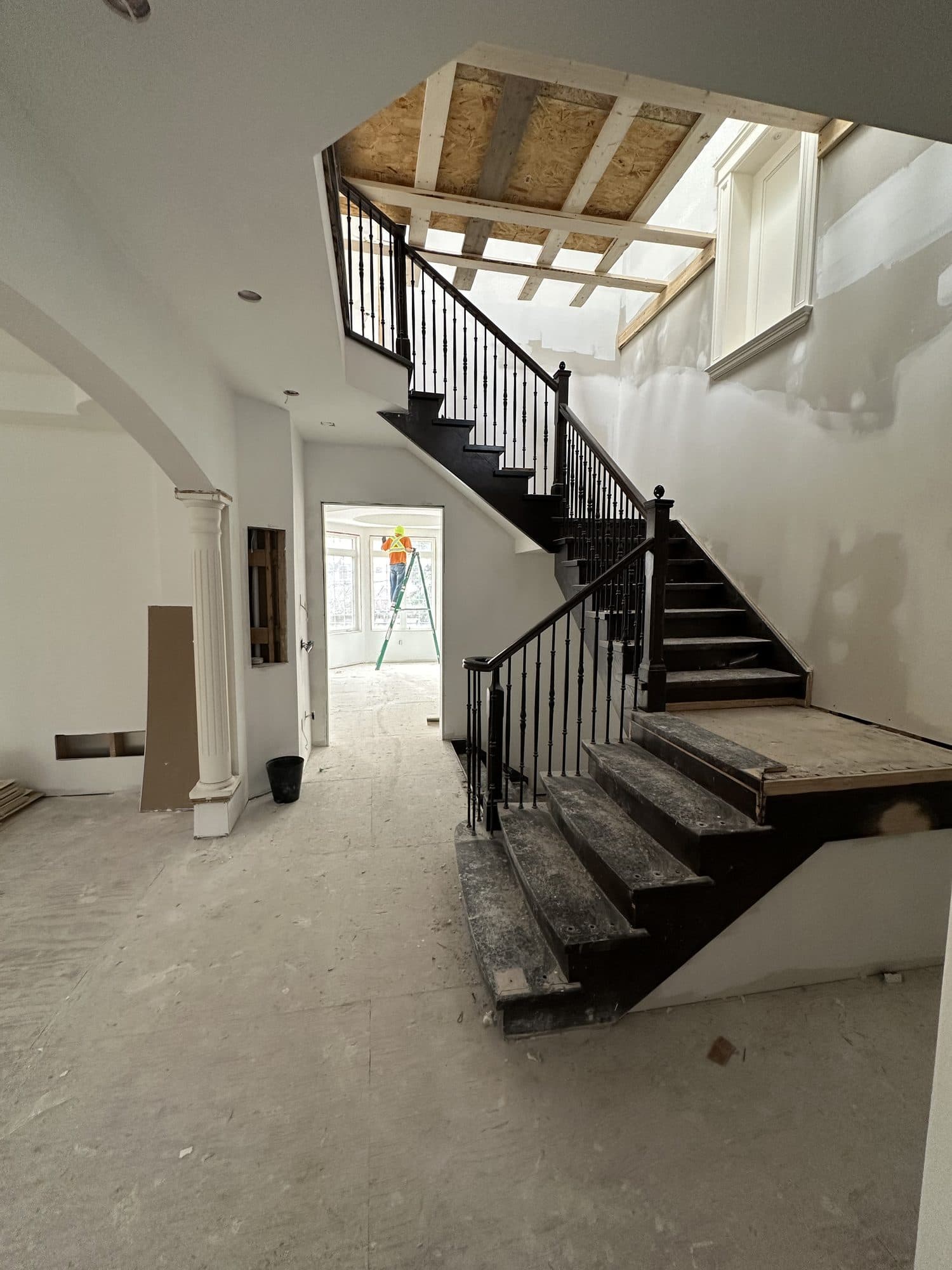 The main staircase under construction, framed and awaiting finishes