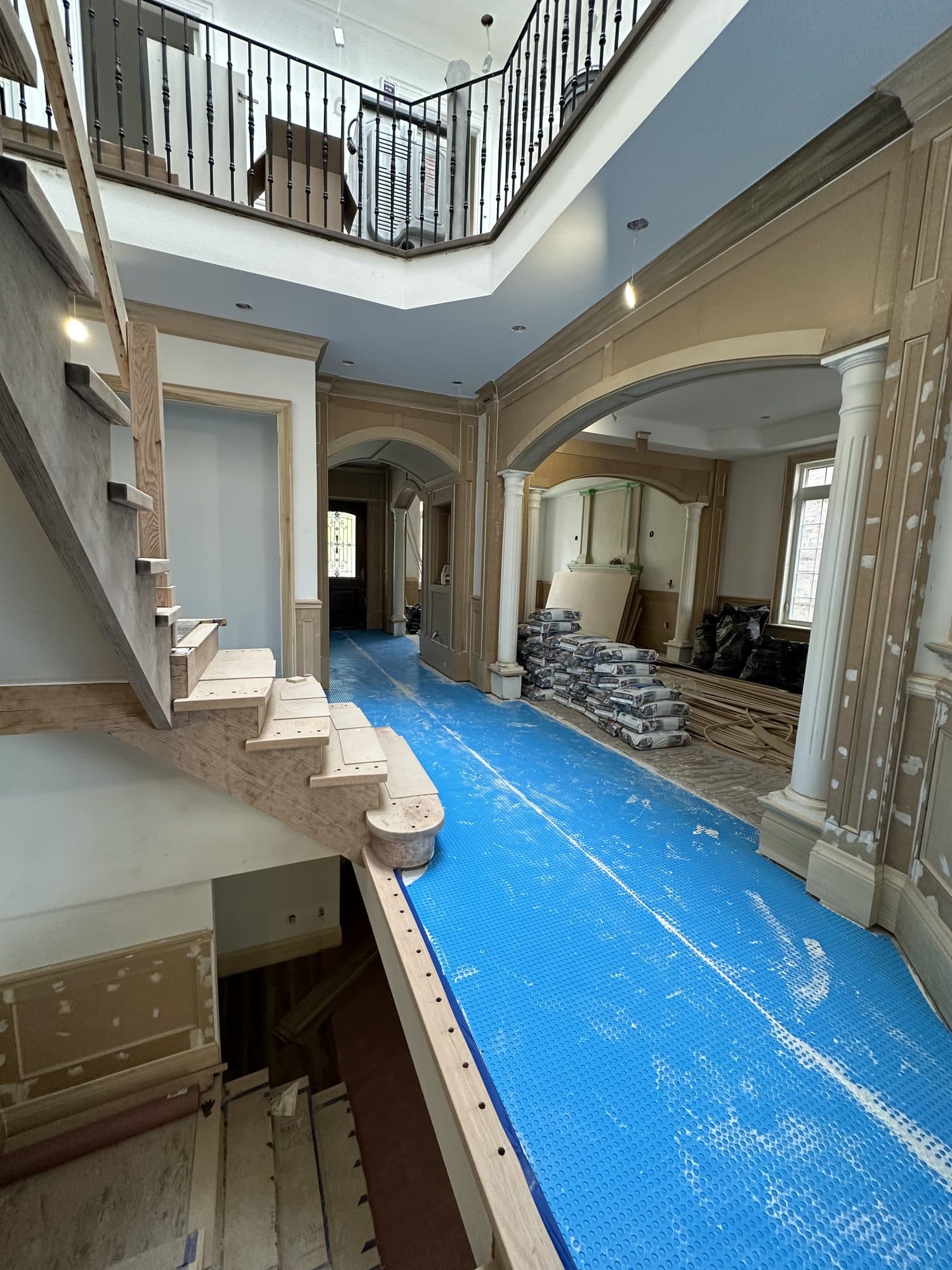 The foyer under floor protection during the build