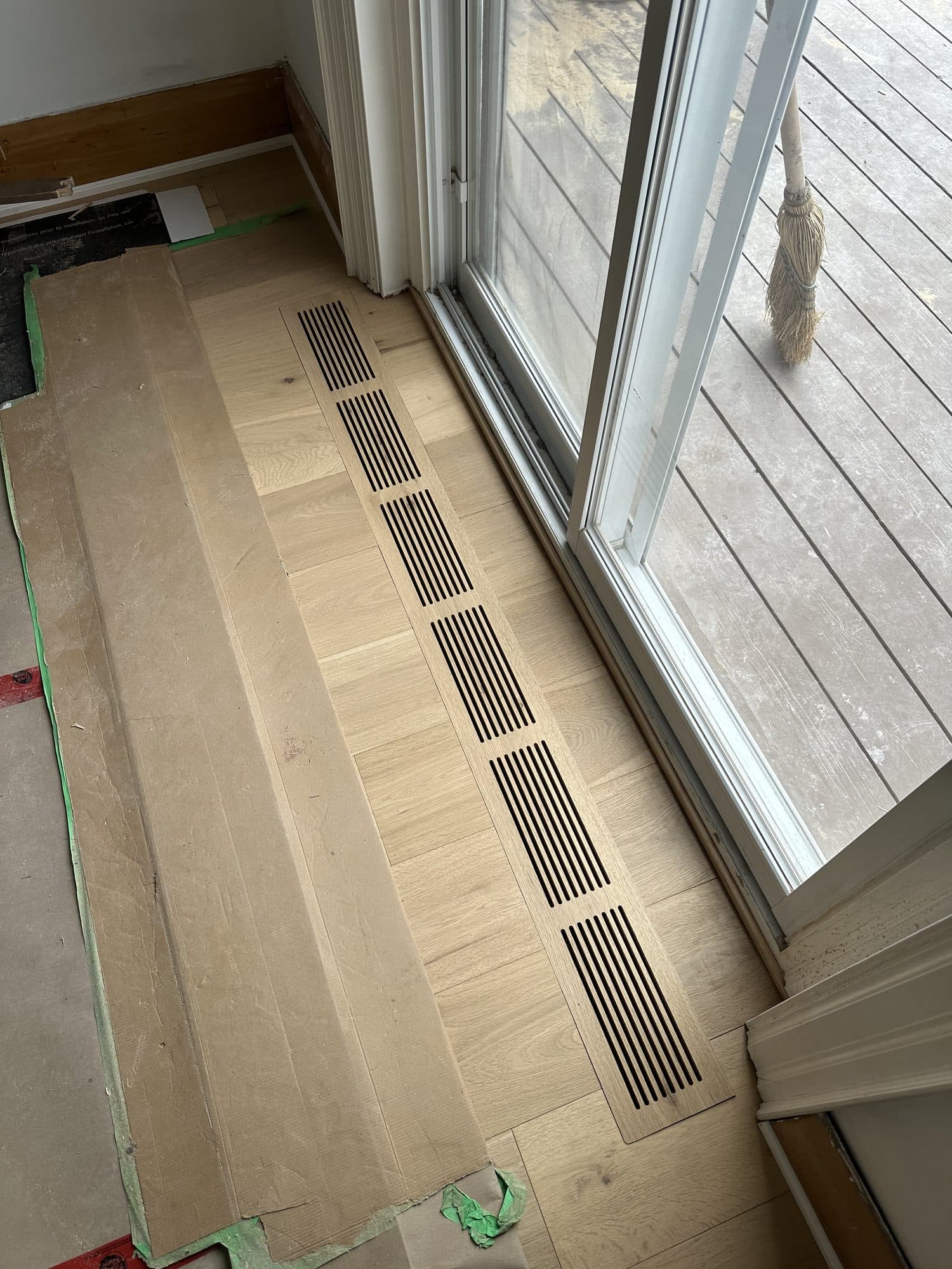 A seamless custom hardwood floor vent by Woodstellar