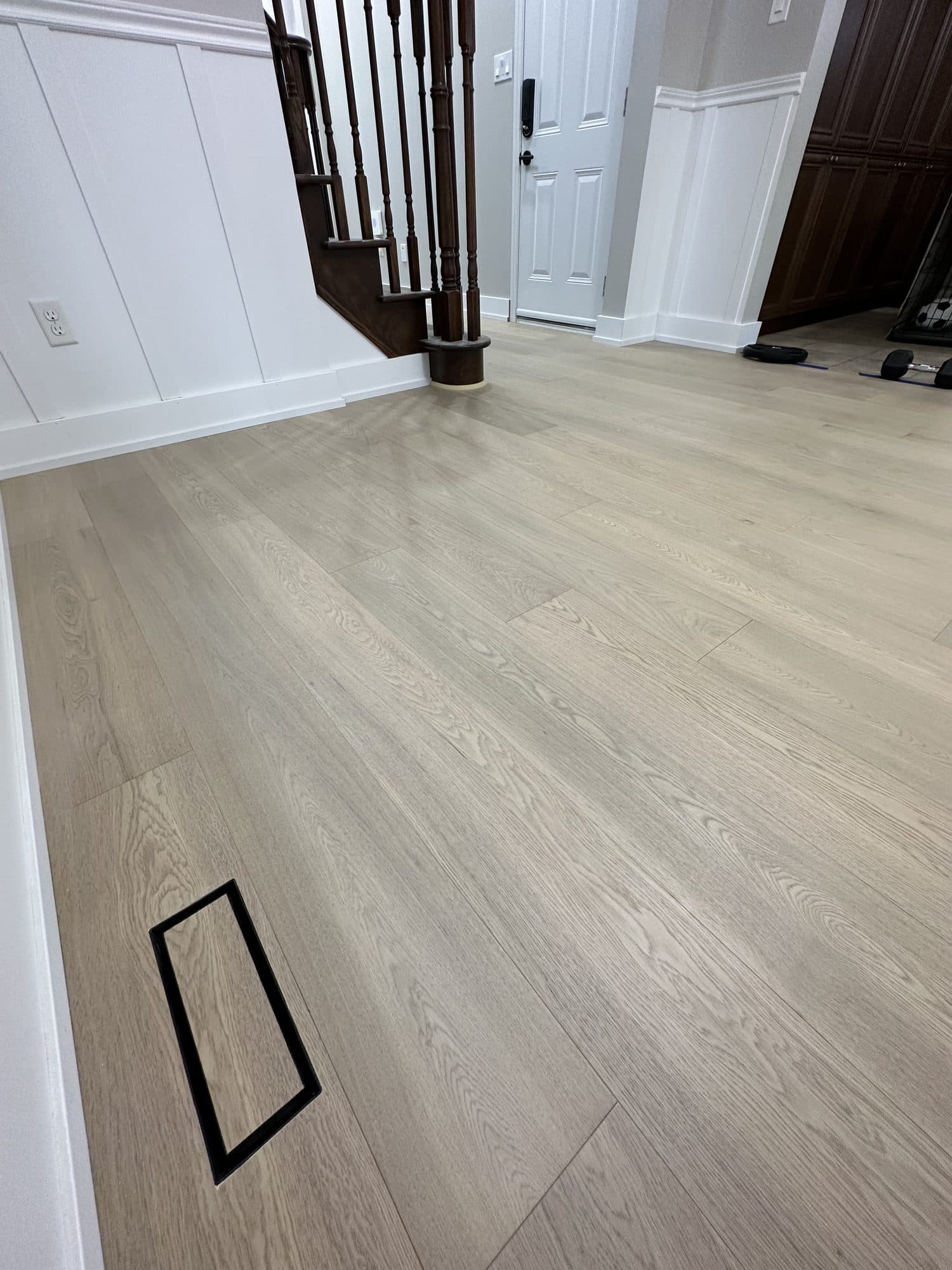 A seamless custom hardwood floor vent by Woodstellar