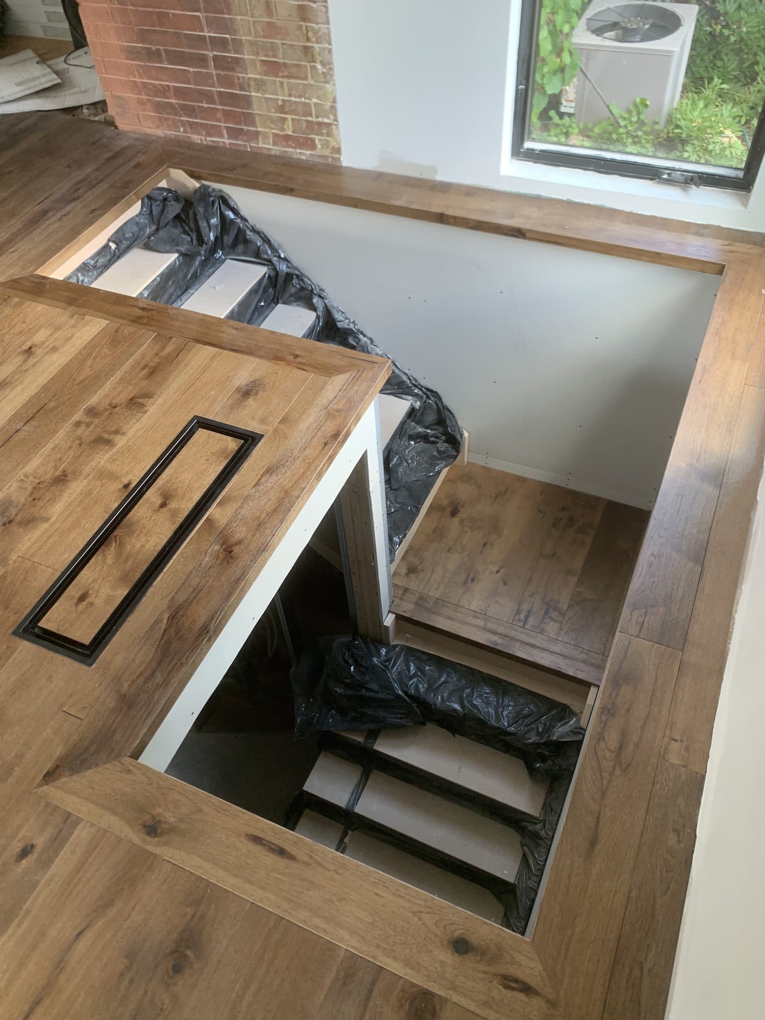 A seamless custom hardwood floor vent by Woodstellar